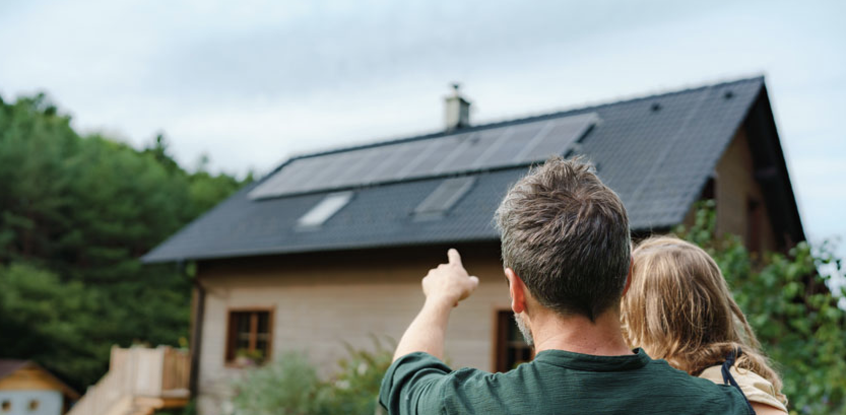 Solar homeowner looking at panels